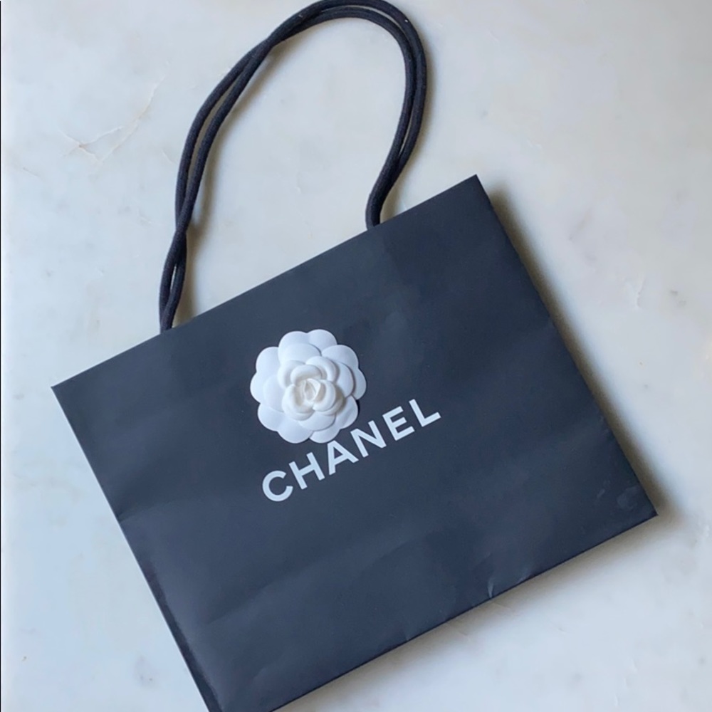 Chanel carry bag with camelia